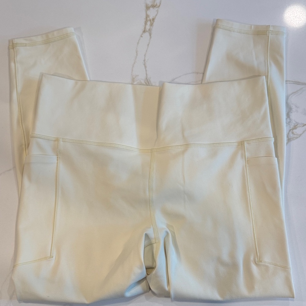 Athleta Salutation Stash 7/8 Pale Yellow Leggings